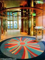 ID 3106 VISION OF THE SEAS (1998/78340grt/IMO 9116876) - Pursers Office foyer.
